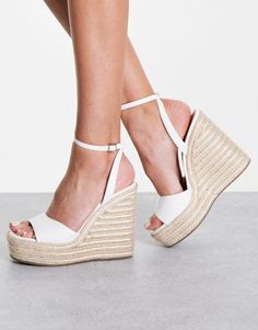 Wedges.by.ASOS DESIGN.Hit new heights.Pin-buckle ankle strap.Peep toe.Rope midsole.Platform sole.High wedge heel.Product Code: 109693806 White Wedge Sandals With Buckle Closure, White Ankle Strap Wedge Sandals For Spring, White Wedge Sandals With Heel Strap For Spring, White Wedge Sandals With Ankle Strap And Buckle Closure, White Ankle Strap Wedge Sandals With Buckle Closure, White High Heel Espadrilles For Spring, Chic White High Heel Espadrilles, White High Heel Espadrilles For Summer, White Platform Espadrilles With Ankle Strap