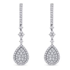 These drop down diamond earrings are the epitome of glamor. Featuring over 2 carats of round cut pave diamonds they dangle beautifully from the ear adding sophistication and elegance to every bride's finished look. 
    These earrings are also available for setting with  semi-precious gems. Please contact us   for more information.     MAIN GEM  
Gem: Diamond 
 Shape: Round 
 Carat Weight: 2.00ctw 
 Color: H 
 Clarity: SI2 
 Earring Style: French Post 
  ADDITIONAL INFORMATION  Style #: EAR911 Dazzling Dangle Diamond Earrings With Pave Setting, Dazzling Diamond Earrings For Wedding With Pave Setting, Classic Teardrop Diamond Earrings With Pave Setting, Formal Bridal Drop Earrings With Pave Setting, Drop Diamond Earrings With Pave Setting For Wedding, Diamond White Bridal Earrings With Pave Setting, Wedding Diamond Earrings With Pave Setting, Classic Bridal Earrings With Pave Setting, Wedding Drop Earrings With Pave Setting