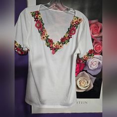 Just Gorgeous. Misses M. Beautiful Floral Embroidery At Arms & Neck. Tee Like Material. Casual V-neck Embroidered Top With Multicolor Embroidery, Spring Embroidered V-neck T-shirt, Casual V-neck Top With Multicolor Embroidery, Multicolor Floral Embroidered V-neck Top, Summer Floral Embroidered V-neck T-shirt, Multicolor Embroidered Cotton V-neck Top, Embroidered V-neck T-shirt For Summer, Red Bohemian T-shirt For Spring, Cotton V-neck T-shirt With Floral Embroidery