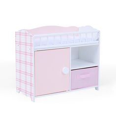 a pink and white doll's crib with drawers on the bottom shelf is shown