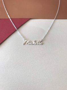 "Mothers Day Gift -Personalized Handmade Silver Jewelry Crafted with love from solid sterling silver-Christmas day gift -Valentines day gift-Birthday gift-Anniversay Gifts Name necklace * Gold Necklace * Mini Necklace * Bridesmaid Gift * Personalized Gifts * Tiny Name Necklace * Gift For Mom * Gift For Women This necklace is for you .Type the name you want to explain.If you have a different question,you can ask any time from the messages section. -About Us- DreamNecklaceArt Produces this necklac Silver Custom Name Necklace, Dainty Custom Name Pendant Charm Necklace, Meaningful Silver Jewelry For Birthday Gift, Name Pendant Charm Necklace For Birthday Gift, Sterling Silver Name Charm Necklace For Mother's Day, Sterling Silver Charm Necklaces With Names For Mother's Day, Mother's Day Sterling Silver Name Charm Necklaces, Dainty Sterling Silver Charm Necklaces For Personalized Gifts, Sterling Silver Dainty Charm Necklace For Personalized Gift