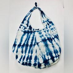 Made In The Usa Limited Quantity “One Of A Kind” Boho Bag Roomy And Light Weight. This Denim Boho Sling Features A Top Knot That Allows You To Choose A Custom Length. This Bag Makes Any Outfit Instantly Cute. Details- Color: Tie Dye- Indigo Blue And White Bag: Boho Sling Dimensions: 15”H X 13'“L Top Knot/ Bow Denim Tie Dye Strap Drop: 13” Lined Blue Casual Hobo Bag For Daily Use, Casual Blue Canvas Bag With Adjustable Strap, Casual Blue Hobo Bag For Daily Use, Summer Crossbody Hobo Bag With Adjustable Strap, Trendy Blue Hobo Shoulder Bag, Casual Blue Hobo Bag For Travel, Casual Blue Hobo Bag, White Beach Hobo Bag With Adjustable Strap, Summer Hobo Bag For Daily Use, Crossbody Style