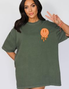 TEE: We use a special vintage washed Comfort Color tee that feature an oversized unisex fit. Stick TTS for a relaxed loose fit, size up for super oversized perfect with biker shorts or size down for a true feminine fit. I upsize to a 2x for a really slouchy oversized fit. You can also upsize 2-3 sizes for a dress look which is trending right now! SWEATSHIRT: We use a classic heavy cotton sweatshirts that feature an oversized unisex fit. Stick TTS for a relaxed loose fit, size up for super oversi Casual Distressed T-shirt For Loungewear, Distressed Relaxed Fit T-shirt, Green Washed T-shirt For Streetwear, Oversized Washed T-shirt With Crew Neck, Oversized Washed Crew Neck T-shirt, Trendy Oversized Washed T-shirt, Distressed Crew Neck T-shirt For Loungewear, Oversized Acid Wash T-shirt For Fall, Oversized Washed T-shirt For Fall