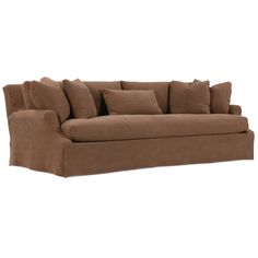 a brown couch with lots of pillows on the top and bottom half, sitting in front of a white background