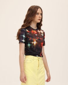 Model (WearingXS):•Â?/span>Height: 174cm | Bust: 80cm | Waist: 60cm | Hips: 89cm | Shoes: 38cmDetails: Black T-shirt with glimmering star graphical printTop Length: NormalSleeve Length: Short SleevesMaterials:95% Polyester + 5% Spandex Stretch T-shirt With Sublimation Print For Spring, Y2k Crew Neck T-shirt For Night Out, Casual Fitted Short Sleeve Top With Graphic Print, Fitted Casual Short Sleeve Top With Graphic Print, Spring T-shirt With Sublimation Print, Y2k Short Sleeve Top For Night Out, Y2k Style Short Sleeve Top For Night Out, Y2k Graphic Print T-shirt For Night Out, Black T-shirt With All Over Print For Summer