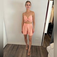 Two Piece Shorts And Crop Set In Peach. Lace Detailing And Cross Front With Spaghetti Strap That Are Adjustable. Shorts Have Zipper On Side. Brand New Never Worn With Tags! Spring Peach Bottoms For Loungewear, Casual High Waist Peach Bottoms, Casual Peach Bottoms For Summer, Peach Bottoms For Spring Vacation, Summer Beach Peach Bottoms, Peach Shorts For Summer, Chic Peach Bottoms For Summer, Casual Peach Short Bottoms, Chic Peach Summer Bottoms