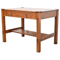 a wooden table with two drawers on one side and an open drawer on the other