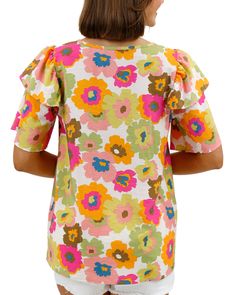 Multi Floral Summer Breeze Blouse | Multicolored Floral Blouse Summer is all about fun, bold patterns, and we’ve got you covered with the Summer Breeze Blouse! This gorgeous top features a subtle, lightly shirred v-neckline for a flattering and feminine fit; plus a playful double ruffle detail at the sleeves, all in a lightweight material and vibrant multicolor floral print that’s perfect for the season. Pair with some shorts and sandals and enjoy those breezy summer vibes! Why you’ll love it: S Spring V-neck Top With Colorful Pattern, Playful Short Sleeve Blouse, Playful Printed Spring Blouse, Playful Spring Printed Blouse, Playful Printed Blouse For Spring, Printed Cotton Blouse With Ruffle Sleeves, Colorful Patterned Tops With Relaxed Fit For Summer, Colorful Pattern Relaxed Fit Tops For Summer, Cotton Ruffle Sleeve Tops With Floral Print