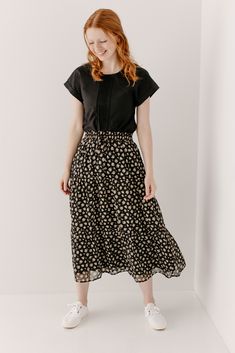 Looking for a little something floral this summer? The 'Stephanie' Skirt is the perfect way to incorporate festive florals subtly. This gorgeous skirt features a tiered silhouette and elastic waistband to keep you comfortable all day. Pair the 'Stephanie' with a simple top and sneakers for heading to that local greenhouse or grabbing brunch with friends! Self & Lining 100% Polyester Hand Wash Cold Do Not Bleach Lay Flat to Dry Cool Iron if Needed Fully Lined Model Height 5'5" | Wearing Size Smal Casual Long Skirt For Everyday Wear, Modest Relaxed Tiered Skirt, Modest Tiered Skirt, Modest Relaxed Fit Bottoms For Spring, Modest Bottoms For Day Out, Flowy Everyday Midi Skirt, Everyday Flowy Midi Skirt, Casual Tiered Denim Skirt, Everyday Long Skirt For Spring