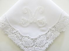 "GORGEOUS 2.5\" Vine Wedding Monogram on a beautiful wedding lace Handkerchief for the Bride, Mother of the Bride or Mother of the Groom, Simply Breath-Taking! *Please note that Title (eg. Mother of the Bride, Mother of the Groom or Bride and Groom's names) or wedding date can be added for an additional cost, you can make your decision at checkout. 100% Cotton, handkerchief Size~~Approx. 11\"x11\" Handkerchief Color Shown: White Color of Monogram shown: White Please include the following persona Elegant Personalized Handkerchief For Bridesmaid Gift, Elegant Customizable Handkerchiefs For Bridesmaid Gift, Elegant Personalized Wedding Handkerchiefs, Classic Personalized Wedding Handkerchiefs, Elegant Customizable Wedding Handkerchiefs, Elegant Wedding Handkerchiefs Customizable, Elegant White Handkerchiefs With Lace Work, Classic Handkerchiefs With Lace Trim As Gift, Elegant Lace Work Handkerchiefs Gift