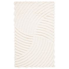 a white rug with wavy lines on the bottom and sides, in varying shades of cream