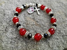 "Saint Michael Protection Bracelet (Size ~6.75\" Fits Petite Wrists) Features 8mm Juicy Maroon/Red Jade gemstone Beads, Black Crystal Rondelles. Strengthen your spirit! Includes 1/2\" Red Enamel Saint Michael Medal and Miniature Crucifix charm. (Made in Italy) Prayer is a powerful tool and so is FAITH! For centuries many have prayed to Saints for healing. They pray for them to petition before God on their behalf for recovery from an illness or condition. Remember the key is prayer! Stretch Brace Red And Black Bracelets, Pray For Them, St Michael Medal, Catholic Bracelet, Deployment Gifts, Jewelry Making Business, Grunge Jewelry, Red Jade, Bracelet Craft Diy