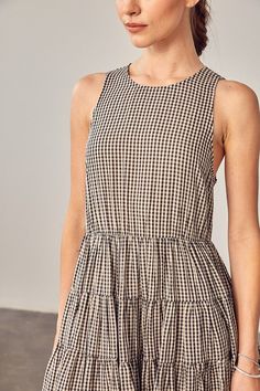 Introducing our Gingham Tiered Dress, a charming and timeless addition to your wardrobe. This dress features a classic gingham print that exudes a sense of nostalgia and style. The tiered design adds depth and movement to your look, creating an effortlessly chic and playful ensemble. With its comfortable fit and fashionable design, it's perfect for a variety of occasions. Size + Fit- Model is wearing size S- Measurements taken from size S- 5'9" / 175CM- 32-24-34 Style: Romantic Print / Pattern: Sweatshirt Jean Jacket, Women Cargo Pants, Black Gingham, Tiered Mini Dress, Gingham Fabric, Simple Girl, Women Cargos, Blue Gingham, Gingham Print