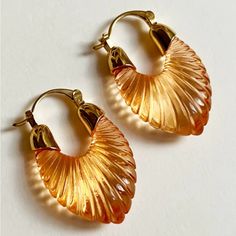 Anthropologie “Gabi” Sculptural Mandarin Orange Striped Scalloped Striated Parabola U-Shaped Frosted Tranparent Illuminated Dreamy Thick Loop Gold Hoops. Trendsetting Carved Scalloped Thick U-Shaped/Parabolic Hoops In A Mandarin Orange Color That Illuminate In The Light. With Gold Caps At The Tops/Peaks And Bar Snap Closure. Lightweight! New. *Also Available In Cornflower Blue, Navy Blue, Mint Green, Coffee Brown, & Silver! Measurements: Eardrop Length: 1.3” Earring Width: 0.8” If You Want It, D Silver Highlights, Gold Caps, Anthropologie Jewelry, Gold Orange, Cornflower Blue, Gold Hoops, Orange Gold, Snap Closure, Mint Green