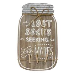 a wooden mason jar with the words lost soaps seeking sole mates written on it