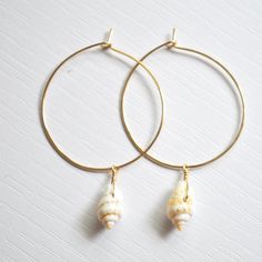 Handmade Gold Shell With Beachy Style, Gold Shell-shaped Hoop Earrings For Beach, Handmade Gold Hoop Earrings For Vacation, Adjustable Gold Shell With Beachy Style, Beachy Gold Shell Earrings, Adjustable Gold Shell In Beachy Style, Gold Dangle Shell Earrings For Beach, Gold Dangle Shell Earrings Ocean-inspired, Handmade Gold Hoop Earrings For Beach