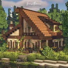 a very nice looking house in the middle of some trees and bushes with flowers on it