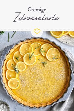 a pie with lemons and rosemary on top is shown in front of the words cremee limonate