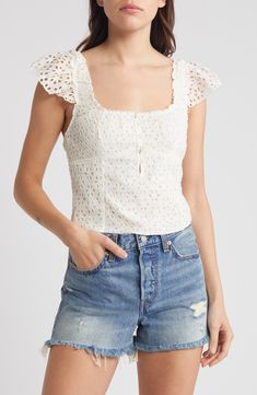 Turn on the romance in this top with a layer of pretty eyelet defining the fitted silhouette and forming the barely there cap sleeves. 17" length (size Medium) Button half placket Square neck Cap sleeves Partially lined 100% cotton Hand wash, dry flat Imported Chic Sleeveless Eyelet Top, Chic Sleeveless Top With Eyelet Details, Fitted Short Sleeve Top With Broderie Anglaise, Fitted Broderie Anglaise Short Sleeve Top, Chic Fitted Eyelet Blouse, Fitted Feminine Eyelet Top, Fitted Eyelet Top For Spring, Spring Tops With Broderie Anglaise, Fitted Broderie Anglaise Tops For Spring