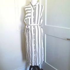 Nwt Anthropologie White/Black Pinstripe Button-Up Sleeveless Maxi Dress. Size 14. Designed By Maeve. Cute Right Chest Side Detail. Comes With An Extra Button. Never Been Worn. So Cool And Perfect For A Breezy Summer Day. Make Me An Offer Or Ask Me More Questions Below! Striped Shirt Dress With Buttons, Elegant Striped Shirt Dress With Buttons, Chic Striped Button-up Dresses, Chic Striped Shirt Dress With Buttons, Chic Striped Dress With Button Closure, Spring Striped Button-up Midi Dress, Striped Button-up Midi Dress For Daywear, Spring Striped Maxi Dress For Work, Striped Maxi Dress For Workwear In Spring