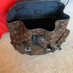 Louis Vuitton Brand New 100% Authentic Come With Dust Bag And Box. The Box Have Tear Down On One Size Because In Accident Open To Make A Tear. This Backpack Have No Sign Of Wear Travel Bag In Monogram Canvas With Original Box, Luxury Travel Bag In Signature Coated Canvas, Black Monogram Canvas Backpack For Travel, Luxury Coated Canvas Backpack, Luxury Signature Coated Canvas Travel Bag, Brown Monogram Canvas Backpack, Designer Backpack For Shopping, Black Monogram Canvas Backpack For Everyday Use, Luxury Coated Canvas Leather Backpack