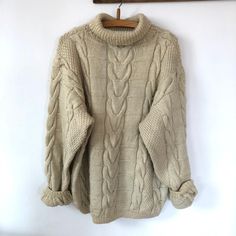 "Such a lovely vintage 80's handknitted wool turtleneck sweater with cable knit motifs. Light beige color. Material:100% wool Oversized fit. Will fit size M-L Measurements: shoulder to shoulder:20\" pit to pit:22,5\" length:25\" Very good condition." Brown Turtleneck Sweater, Wool Turtleneck Sweater, Suede Blazer, Linen Mini Dress, Wool Turtleneck, Oversized Pullover, Pullover Sweater Women, Vintage Wool, Vintage Linens