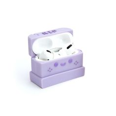 two white ear buds in a purple case