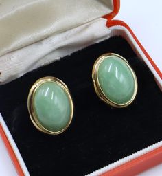 Vintage marked 14k gold & oval shape light natural jade cabochon w Omega back earrings, In good vintage condition, It's 16 mm wide 22 mm long , Jade 20 mm x 14 mm. Weighs 6.7 gram. Thanks. Ship US only Classic Oval Cabochon Clip-on Earrings, Gold Oval Cabochon Clip-on Earrings, Oval Jade Earrings For Anniversary, Formal Jade Earrings, Natural Jade, Jewelry Earrings Studs, Oval Shape, Labour Day, Etsy Earrings