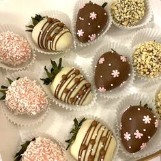 chocolate covered strawberries are arranged on a tray