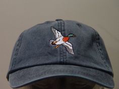 Embroidered Mallard Duck Hat by Price Embroidery and Apparel Navy Embroidered Baseball Cap, Navy Embroidered Cap, Adjustable Navy Embroidered Hat, Casual Cap With Embroidered Patch, Casual Snapback Hat With Custom Embroidery, Casual Snapback Hat With Custom Embroidery And Flat Bill, Casual Snapback Hat With Embroidered Patch, Casual Trucker Hat With Short Brim And Embroidered Logo, Casual Trucker Hat With Embroidered Logo And Short Brim