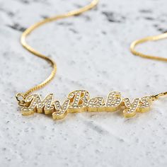 Every stylish woman should have a Custom Nameplate Necklace in their jewelry box. Not only do they look fashionable, but they look gorgeous on their own or layered up. This particular style features a font that is easy to read and that has a beautiful flow to it. The colors are all neutral metallics, which makes them very versatile. All of our name necklaces have a polished surface so that they gleam beautifully in the light. If you are on the hunt for a thoughtful gift for a loved one, this wou