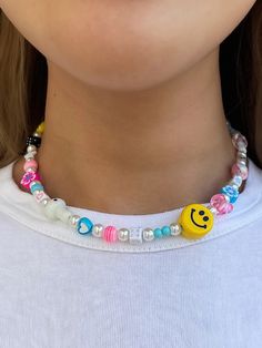 "The 'AOKI' pearl necklace will have you living all your wildest Y2K dreams - featuring colorful acrylic and lamp work glass beads, this necklace is bound to get heads turning. Trust us, this will be a staple piece in your jewelry collection! Waterproof and rust-free. Available in lengths 14\", 15\", 16\", 18\", 20\". All lengths include a 2\" extension chain. Model is wearing 15\". Handmade with love in Los Angeles." Y2k Pearl Necklace, Beaded Pearl Necklace, Funky Necklace, Preppy Jewelry, Y2k Necklace, Colorful Necklace, Diy Bracelets Patterns, Handmade Wire Jewelry, I Love Jewelry