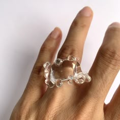 "Welcome to Hidden Glass Atelier! Glad you have found me  ✦ DESIGN    ✧ Simple and elegant band with waves like deco, handmade with clear transparent Murano glass.    ✧ Two styles: chunky and dainty to choose from    ✧ Styling: It is chic to wear alone, or stack with other metal rings for an interesting mix of material look and a pop of color. It is easy to wear up or down with a casual outfit or for a special occasion.  There is a similar style of earrings you could find it here: https://hiddenglassatelier.etsy.com/listing/1598972468    ✧ Durability: All the glass jewelry pieces are tempered by a professional kiln to provide maximum durability.    ✧ Origin: This one-of-a-kind glass ring will be custom handmade for you by me from Murano Venice Italy - the very heart of glass art since the Modern White Rings For Party, Modern White Party Rings, Modern White Crystal Ring Gift, Modern Resin Jewelry For Party, Modern Resin Jewelry For Parties, Modern Clear Round Jewelry, Adjustable Clear Jewelry For Party, Party Resin Ring Jewelry, Modern Clear Glass Jewelry