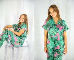 Imagine slipping into the lap of luxury each night. The soft satin blend fabric, the comforting coolness of the material, and that unforgettable lush green banana leaf design that transports you to a tropical paradise. Featuring elevated design details like cuff hem sleeves, elastic waist bottoms, and contrast piping trim. Add a personalized touch with our custom printed text option, making these pajamas the perfect gift for a loved one or keepsake for your own sleepwear wardrobe. Purchase includes the top & bottoms set. See photos for size guide. Colors may slightly vary due to screen settings.  Care: Machine wash in warm water on a *delicate* cycle with low agitation. Tumble dry low or hang to dry. Do not dry clean. Please do not iron directly on personalization If you need to smooth out Wedding Pajamas, Monogrammed Pajamas, Green Banana, Womens Pyjama Sets, Contrast Piping, Banana Leaf, Pyjama Set, Tropical Paradise, Lush Green