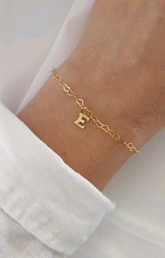 https://begoldenshoppe.etsy.com/listing/1796984315 Mama Bracelet, Personalized Bracelet, Heart Chain, Initial Bracelet, Personalized Bracelets, Heart Bracelet, Charm Bracelets, Gold Filled, Initials