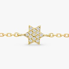 Shlomit This mini diamond Jewish star is perfectly delicate and dainty! It is a beautiful piece for any age and extra special as a Bat Mitzvah gift. This 14k solid gold bracelet is available in Yellow Gold, White Gold, and Rose Gold. - Handmade- Solid Gold- Natural Diamonds- Star Size: 9 mm- Total Diamond Carat Weight: .04 ctw All pieces come beautifully boxed in suede pouches you can always use (which really comes in handy when traveling!) 14k Gold Bracelets With Pave Setting For Gift, 14k Gold Bracelets With Pave Setting As Gift, 14k Gold Bracelet With Pave Setting As Gift, Jewish Star, Solid Gold Bracelet, Bat Mitzvah Gifts, Diamond Star, Diamond Carat, Star Of David