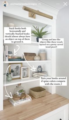 an open book shelf with some books on it and other things in the shelves below