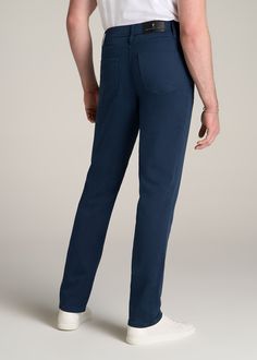 About Our Everyday Comfort 5-Pocket Pant for Tall Men Taking comfort to a new level. These 5-Pocket Pants for tall men are destined to be an everyday favorite. Made with a moisture-wicking fabric featuring antibacterial properties, they’ll keep you feeling fresh from the office to the outdoors. We didn’t just want to make another pair of slacks for tall men, we wanted to make the first pair you’ll grab on a day off, or pack for a weekend excursion. That’s why we’ve built these men’s tall pants w Straight Leg Bottoms With Functional Pockets, Cotton Jeans With Pockets, Classic Straight Bottoms With Patch Pockets, Classic Straight Bottoms With Pockets, Relaxed Fit Straight Leg Bottoms With Pockets, Relaxed Fit Flat Front Pants With Pockets, Blue Work Pants With Straight Hem And Pockets, Classic Jeans With Welt Pockets And 5-inch Inseam, Blue Work Pants With Pockets And Straight Hem