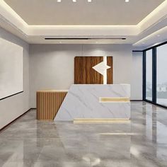 an empty lobby with marble flooring and white walls