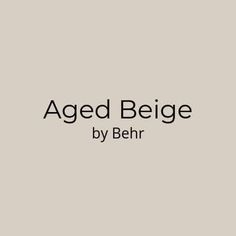 the words aged beige by behr are in black and white