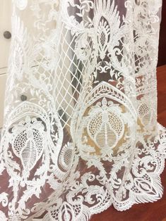 Couture Lace Fabric by yard in Off White Retro Floral Bridal | Etsy White Embroidered Fabric With Lace Trim For Ceremonies, Delicate Lace Gown, Elegant Lace Patchwork Tulle, Floor-length Lace Gown With Scalloped Lace, Floor-length Lace Gown With Scalloped Detail, Floor-length Lace Gown With Lace Trim, Ceremonial Lace Gown With Scalloped Lace, Ceremonial Scalloped Lace Gown, Ceremonial Lace Gown With Scalloped Details