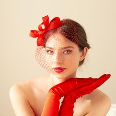 The fascinator and veil in rich  poppy red colour has simple, understated design, yet it is  a striking headpiece for a wedding guest or bridesmaid. Elevate your style with a touch of minimalist charm and understated elegance. This accessory effortlessly provides the essence of femininity, making it the perfect choice for those seeking refined sophistication. Pictured in poppy red. Available in various colours, please, see pictures and colour option menu. The bow headpiece features a unique desi Red Wedding Fascinator, Red Hair Accessories For Wedding And Kentucky Derby, Red Hair Accessories For Kentucky Derby Evening, Red Headband Fascinator For Wedding, Red Fascinator For Wedding At Royal Ascot, Red Headband Hat For Wedding, Red Fascinator For Kentucky Derby Wedding, Red Fascinator For Wedding At Kentucky Derby, Red Summer Wedding Headband