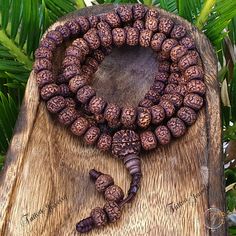 "This attractive and powerful Japa Mala is made with Rudraksha bead that are naturally stained and oiled to achieve their beautiful dark color and aged appearance.  📿Mala Beads, or Buddhist prayer beads, are a set of sacred rosary beads for chanting & counting mantras, meditation, prayer, yoga & reflection. Mala is a Sanskrit word meaning garland. The Tibetan word for mala is threngwa (Tibetan  ཕྲེང་བ) . Seed malas are some of the most common malas used in Tibet and Nepal. Buddhist Prayer Beads are sometimes referred to as Japa mala, japa is a Sanskrit word meaning \"repeat internally\".📿 Specifications  * 108 Rudraksha Seed (9-9.5mm approx.) soaked in oil to get darker color plus 14mm Guru Bead  * This mala is hand strung on durable knotting cord * Fixed knot closure * Total Mala Length Spiritual Brown Beaded Bracelets For Rituals, Spiritual Wooden Beads Bracelets For Festivals, Spiritual Festival Bracelet With 108 Beads, Traditional Beaded Bracelets For Meditation With 108 Beads, Spiritual Festival Bracelets With 108 Beads, Spiritual Gemstone Beads Bracelet For Festivals, Spiritual Beaded Bracelets For Festivals, Traditional 108 Beads Bracelet For Festivals, Spiritual Beaded Bracelets For Rituals