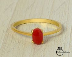 PRODUCT CODE --- GOLD RING STONE --- NATURAL CORAL BIRTHSTONE --- MAY METAL --- 14K SOLID GOLD PRODUCTS TYPE --- RING STONE DIMENSION --- 4X6 MM STONE WEIGHT --- .60 CTS. GOLD WEIGHT --- 1.15 GM TOTAL WEIGHT --- 1.25 GM Coral benefits - Increased Confidence and Courage. It provides the necessary courage to overcome obstacles and enemies and ensures victory for the wearer. The first advantage of wearing Coral gemstone is it gives victory over the enemies. Wearing Coral protects from evil eye and Handmade Gold Ring For Birthday, Stackable Gold Ruby Ring For Gift, Pink Opal Jewelry, Red Coral Ring, Opal Jewelry Set, Pink Opal Ring, May Birthstone Rings, Online Gold Jewellery, Gold Mangalsutra