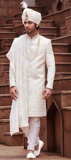 White and Off White color Sherwani in Art Silk fabric with Embroidered, Sequence, Thread work White Churidar With Intricate Embroidery For Ceremonial Occasions, Traditional White Churidar For Reception, Transitional White Churidar With Intricate Embroidery, White Resham Embroidery Churidar For Ceremonial Occasions, White Sherwani With Cutdana And Long Sleeves, White Embroidered Fabric With Traditional Drape For Ceremonial Use, White Embroidered Bandhgala For Traditional Ceremonies, White Embroidered Fabric For Ceremonial Traditional Drape, Embroidered White Bandhgala For Traditional Ceremonies