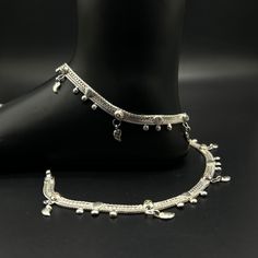 Name of product:  Pure Silver Light Weight Anklet / Silver Payal Weight: 39.5 grams. Length: 26.8 centimeter  FREE EXPRESS SHIPPING -----Feedback::- A satisfied customer is our top priority and your feedback forms the backbone of our success. Don't forget to give positive feedback along with good ratings. Thank You Handmade Adjustable Anklets, Silver Ankle Strap Anklets For Festival, Adjustable Metal Traditional Anklets, Adjustable Metal Anklets For Festivals, Traditional Adjustable Metal Anklets, Elegant Adjustable Anklets For Festivals, Silver Ankle Wrap Anklets For Festival, Adjustable Metal Anklet For Festive Occasion, Festival Silver Ankle Wrap Anklets