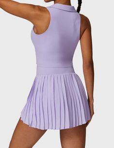 This 2-piece tennis skirt set features a V-neck polo top and a high-waisted pleated skirt for a sporty, cute look. Crafted from ultra-soft, breathable fabric, it offers comfort and freedom of movement, complete with built-in shorts for coverage. Perfect for tennis, golf, or casual wear—add both pieces to your cart to complete the look!   Feature   Top:   V-neck polo collar   Sleeveless design   Removable cup pads   Skirt:    High waisted waistband   Irregular pleated hem   Built-in shorts   Inne Pleated Tennis Skirt, High Waisted Pleated Skirt, Sport Bra Top, Collar Top, Tennis Skirt, V Cuts, Gym Wear, Top Sales, Flare Pants