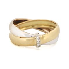 two gold and white rings with diamonds on each one, set in 18k yellow gold