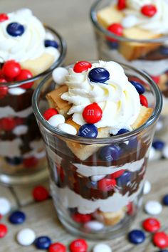 patriotic desserts in small glass cups with red, white and blue candy on top