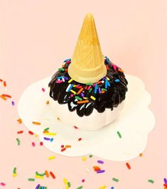 an ice cream cone with sprinkles on top